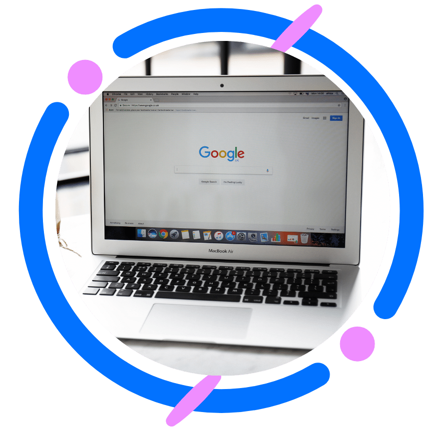 A person using a MacBook Air to search on Google. Find the information and products you need with the power of Google search.